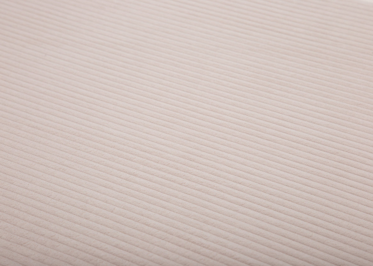 Stoffnahaufname vom Cord in Creme