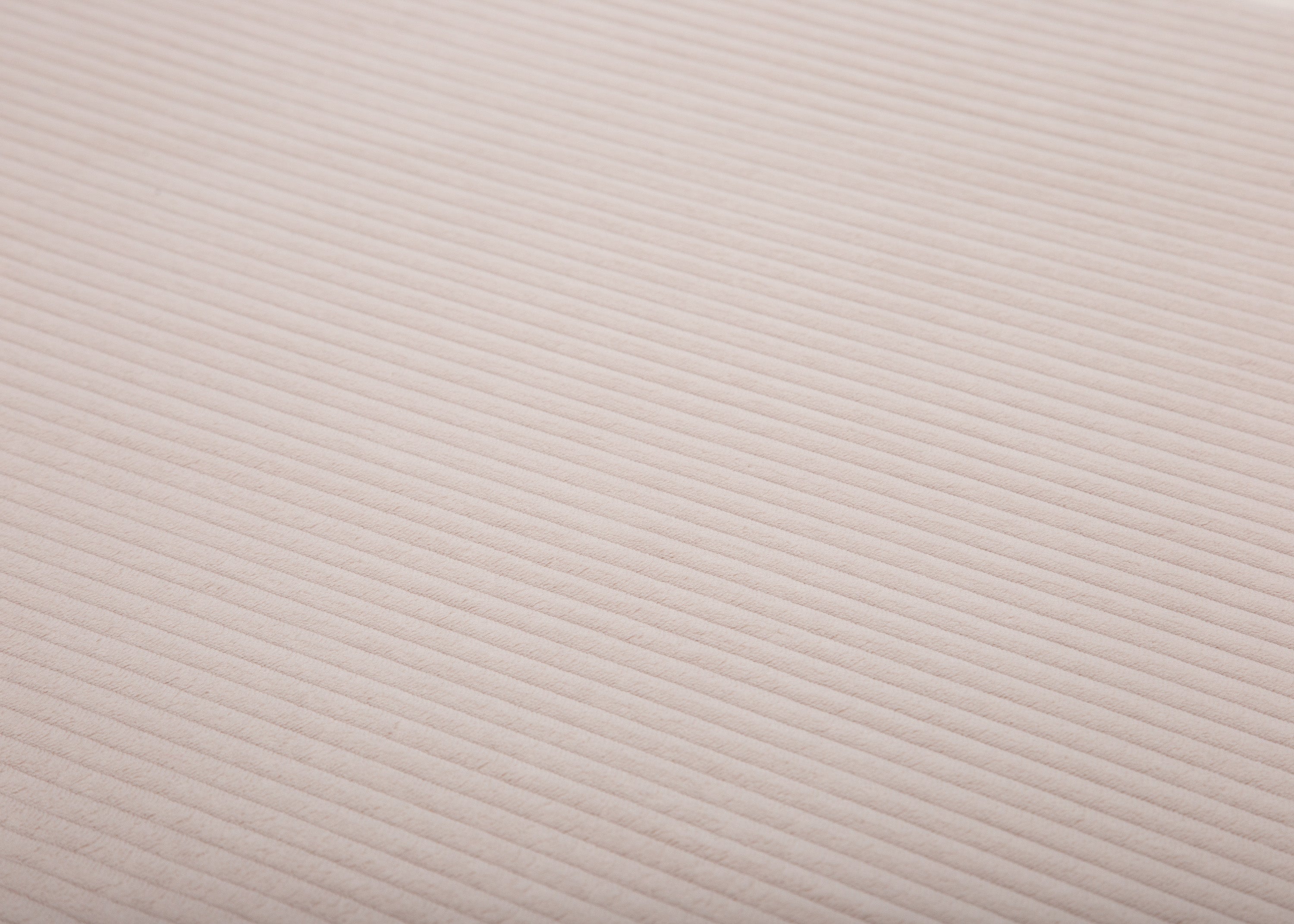 Stoffnahaufname vom Cord in Creme